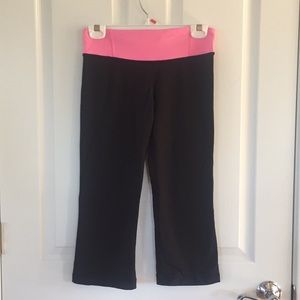 Lululemon black crops with pink waist band